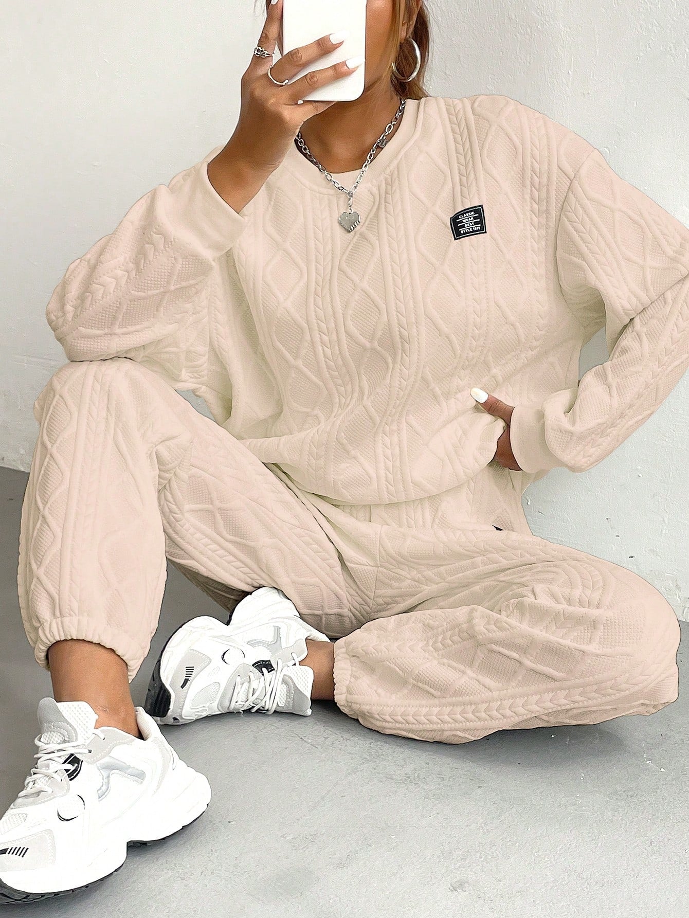 Conjunto feminino de moletom texturizado Arelis