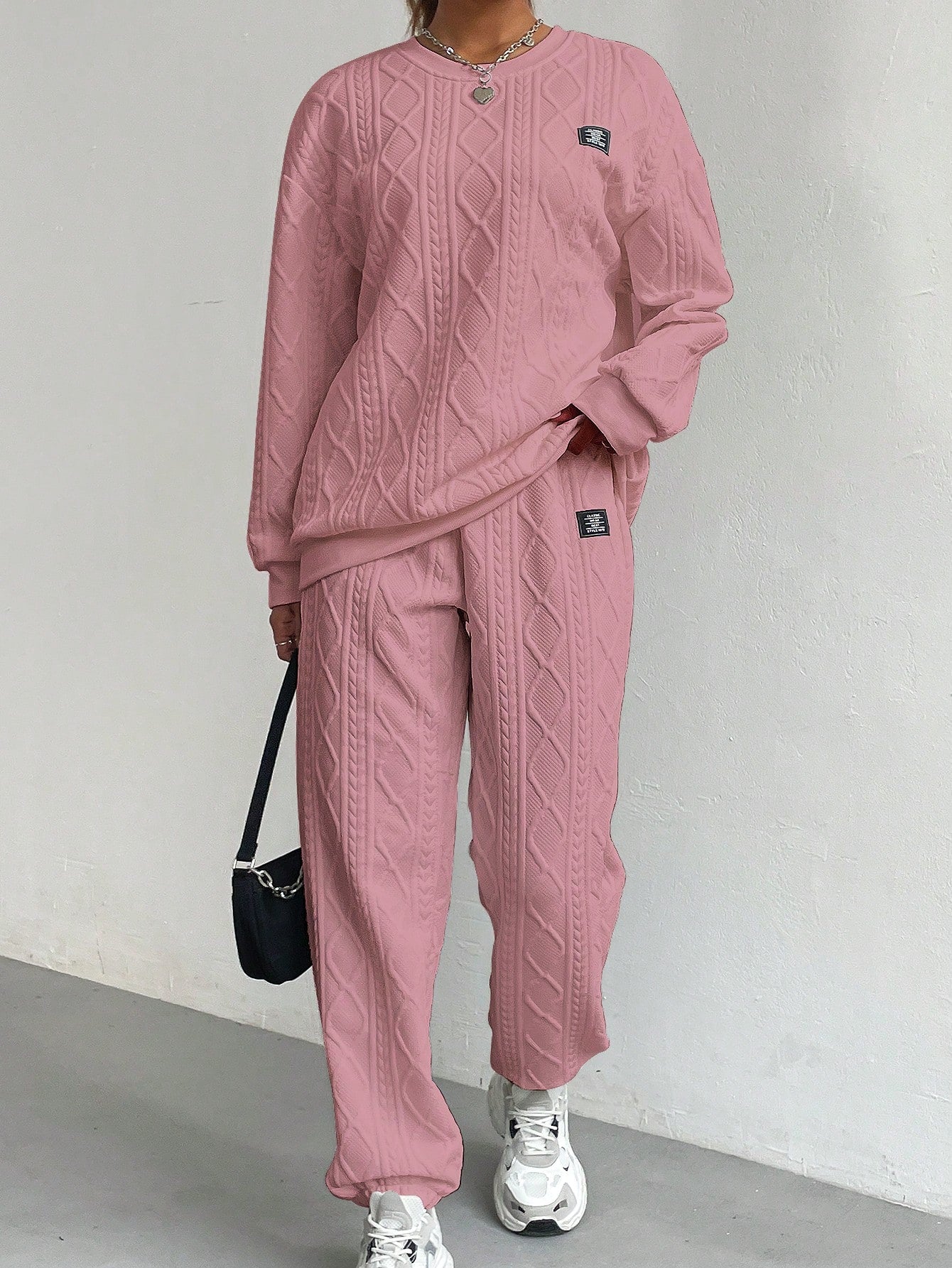 Conjunto feminino de moletom texturizado Arelis