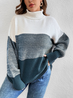 Suéter feminino blocos de cor e gola alta em tricô Kellys. Plus Size