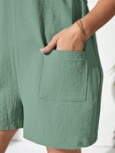 Macacão Feminino Plus Size Com Bolso Frontal E Nó Nas Alças