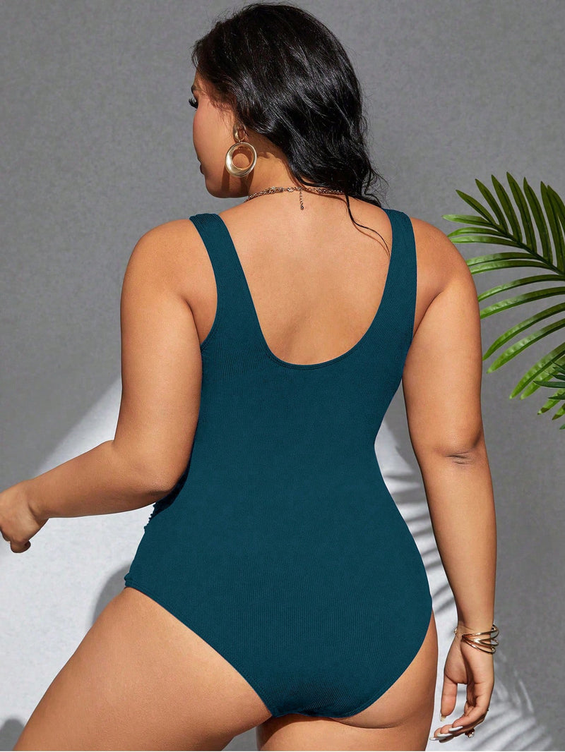 Maiô feminino listrado com detalhe cruzado Jeilyn. Plus Size