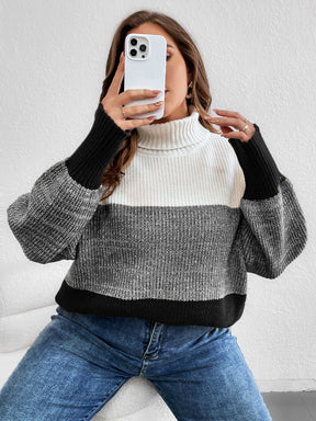 Suéter feminino blocos de cor e gola alta em tricô Kellys. Plus Size